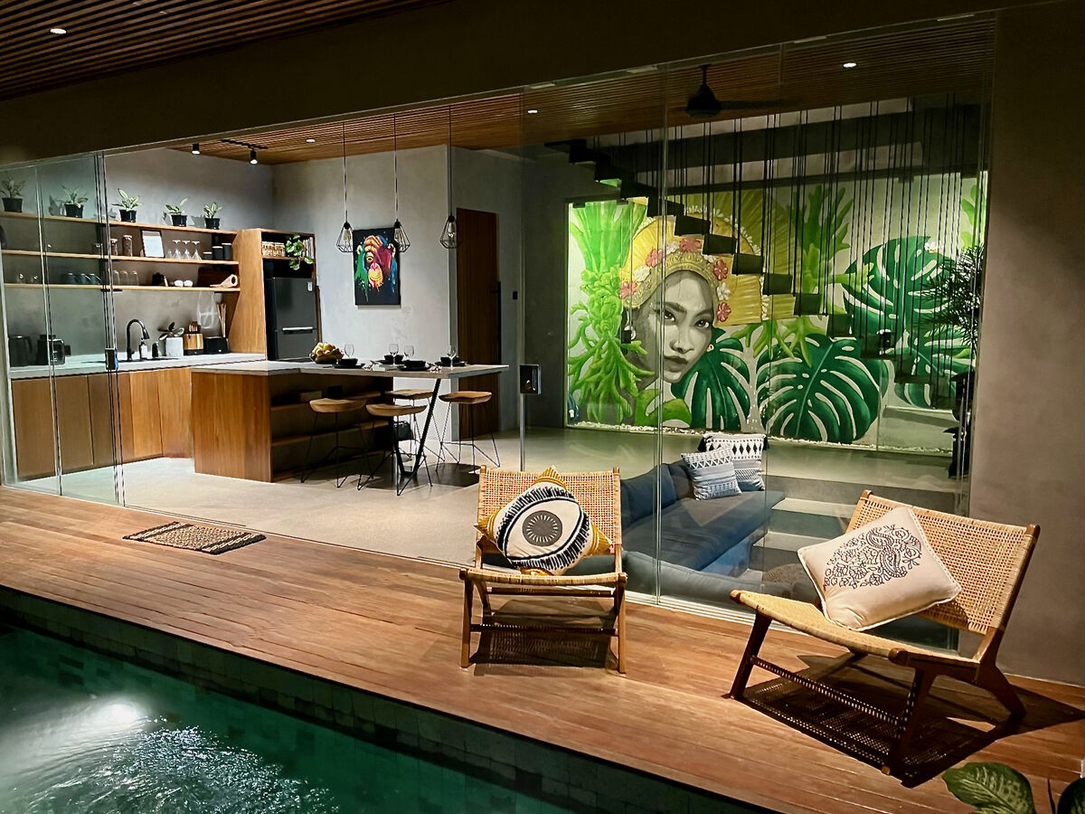 Pool and living area at night